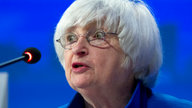 Fed leaves key rate unchanged but hints at future hikes