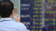 Asian shares push higher, tracking upbeat Wall St session