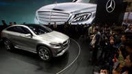 China Probes Automakers, Tech Firms