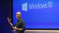 After a year's honeymoon, Microsoft boss Nadella faces pressure to show results