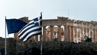 Greece Strikes Deal with Eurozone After All-Night Struggle