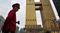 IMF Slashes China Growth Outlook