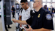 Face scans for Americans flying abroad stir privacy issues