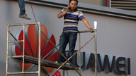China's Huawei posts slower first-half revenue growth