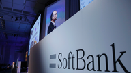 SoftBank raising stake in Sprint, reports falling profit