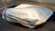 Apollo 11 bag laced with moon dust sells for $1.8 million