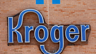 Kroger rides out a storm, competitive and meteorological