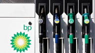BP sees earnings slip as spill costs continue to weigh