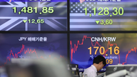 Global stocks mixed amid strong corporate earnings