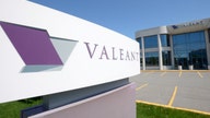 Drugmaker Valeant tops 1Q profit forecasts, chops debt again