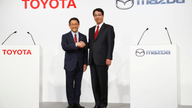 Toyota's quarterly profit improves on strong sales