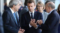 The Latest: Leaders of France, Italy announce shipyard deal