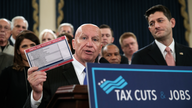 The Latest: Tax bill revisions means less-generous cuts