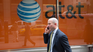 AT&T tops Wall Street's profit, revenue forecasts