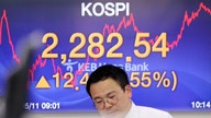 Asian stocks mostly higher in quiet trading; oil prices gain