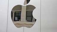 Apple growing cash stash spurs talk of huge acquisition