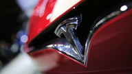 Tesla posts record quarterly loss of $619M on Model 3 delays