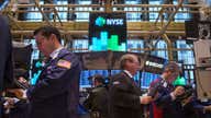 Wall Street Turns Negative as Fed Signals June Rate Hike