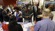 More Americans likely filed for jobless aid last week, but level still near historic lows