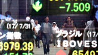 Asian shares mixed as investors on corporate earnings watch
