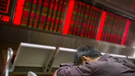 China Shares Tumble to 14-Month Lows as Oil Slips Back