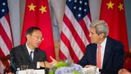 Kerry: US, China to work on cyber code of conduct amid tensions over state-backed hacking