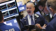 Stock futures rise with retail earnings on tap