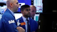 Dow sets new record, Ford, GM rally