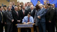 Gov. Walker Signs Bill Making Wisconsin Right-to-Work State