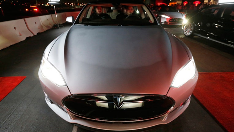 Teslas Insane Mode Wows Passengers Fox Business