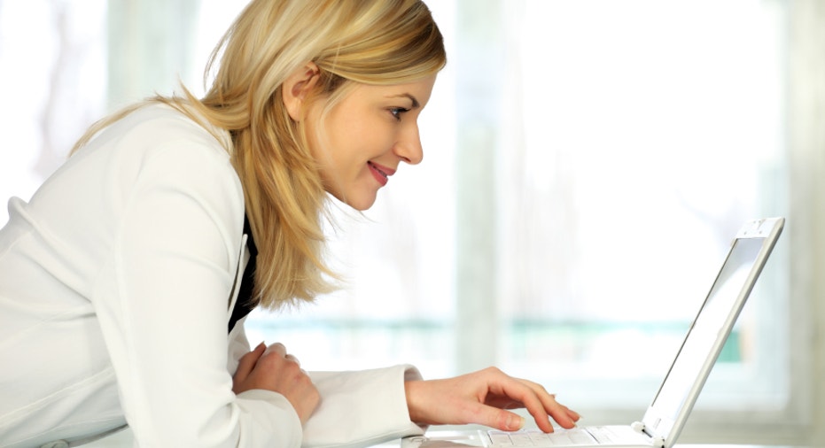 Woman with laptop.