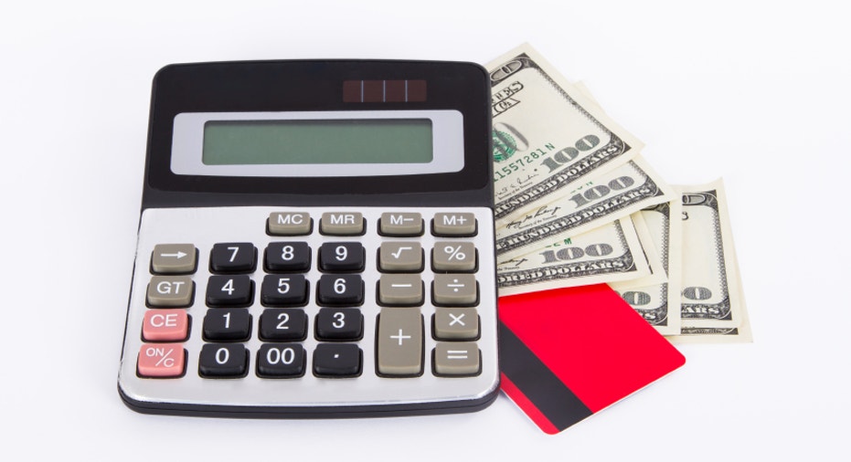 Credit Card, Dollar Bills and Calculator