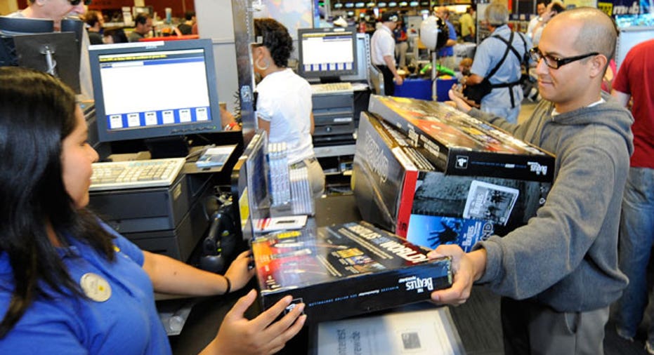 Customer Purchases Game at Best Buy Store