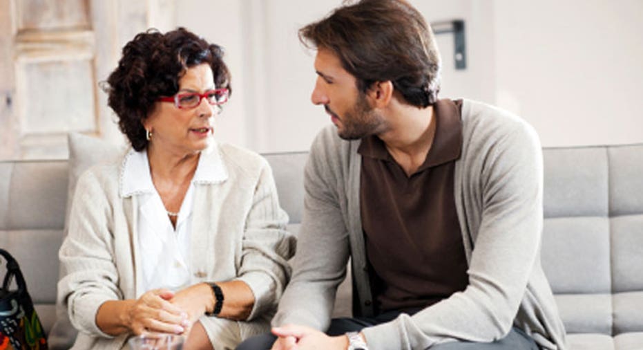 Senior adult woman talking to her son.