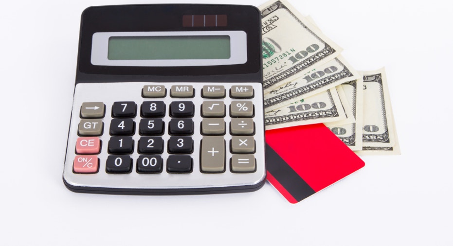 Credit Card, Dollar Bills and Calculator
