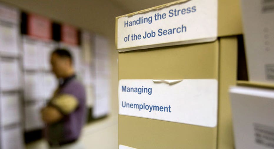 Job Seeker Reads Job Postings Board