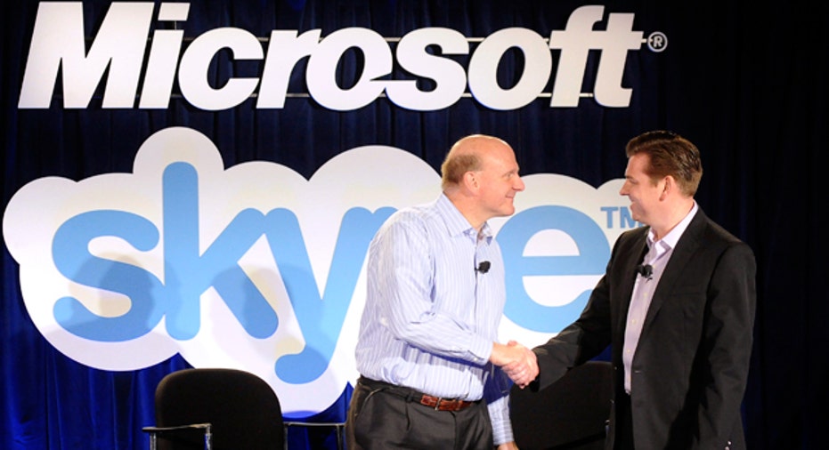 Microsoft CEO Steve Ballmer and Skype CEO Tony Bates Reuters