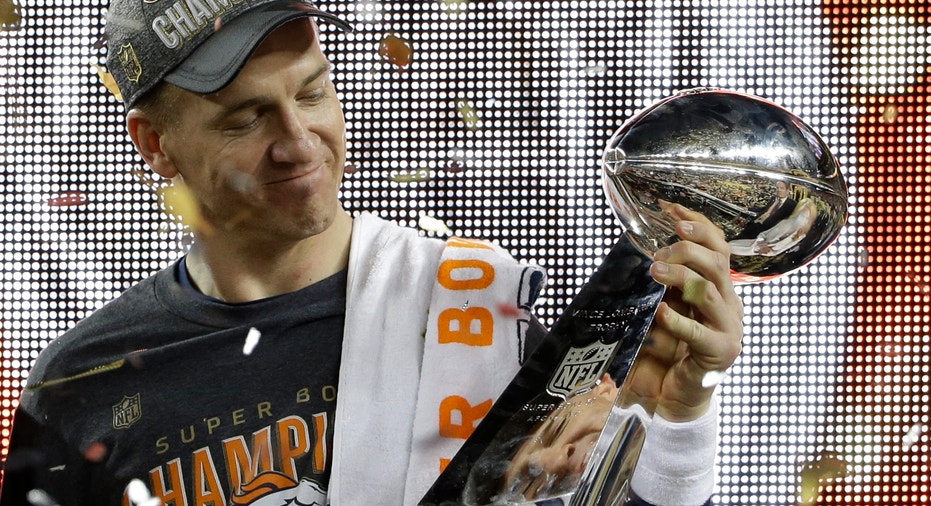 Peyton Manning holding Super Bowl trophy FBN