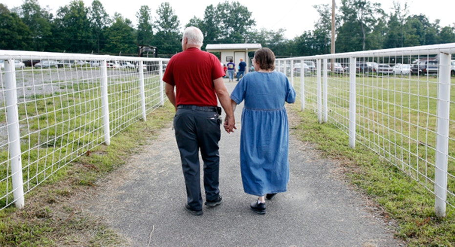 Retirement Couple Walking FBN