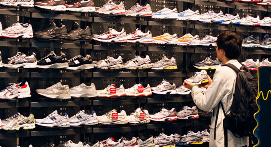 Shopper in Foot Locker, Reuters