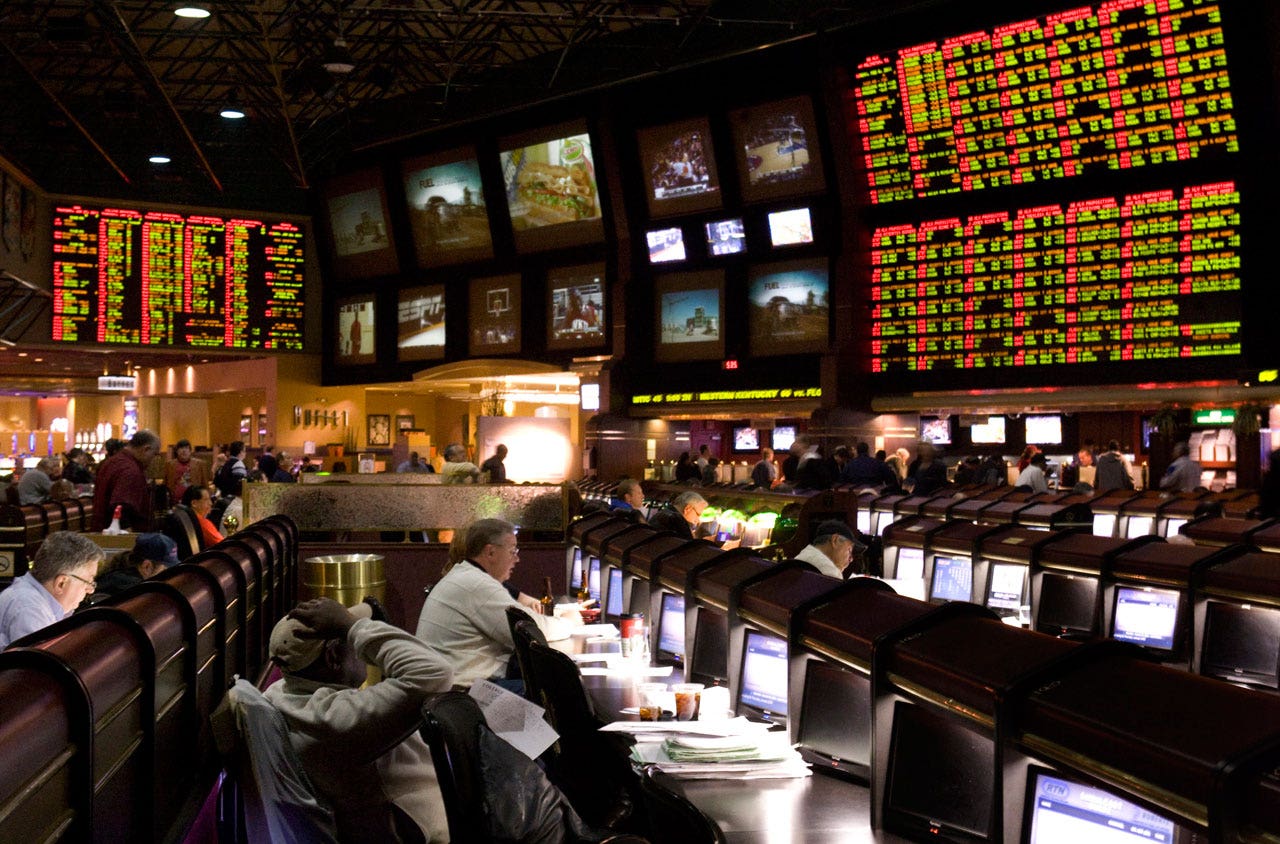 Las vegas sports book betting odds explaining over under betting ideas