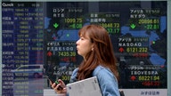 Asian shares gain, shrug off cyberattack, NK missile launch