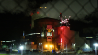 Greenpeace activists light fireworks at French nuclear plant
