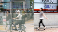 Asian shares mostly higher following gains on Wall Street