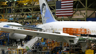 Boeing beats 2Q profit forecasts, raises full-year outlook