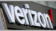Verizon shares rise as it adds more wireless customers