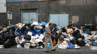Greek trash collectors back to work after 2-week protest