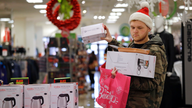 Retailers work to attract shoppers to stores on Black Friday