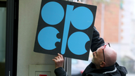 The Latest: OPEC, allies extend oil output cuts through 2018