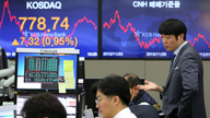 Asian stocks mostly higher following tech recovery, oil deal